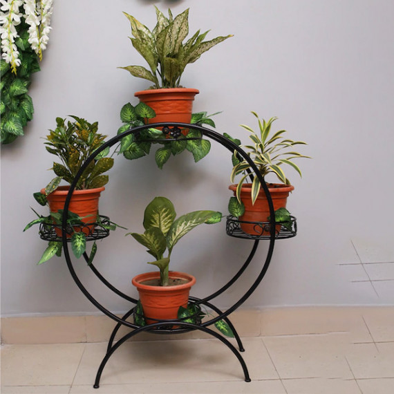 http://13.235.91.190/products/set-of-4-black-solid-metal-planters-with-round-shaped-stand