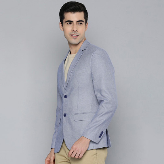 http://13.235.91.190/products/men-blue-self-design-textured-regular-fit-smart-casual-blazer